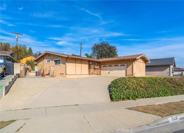 single story home featuring a garage