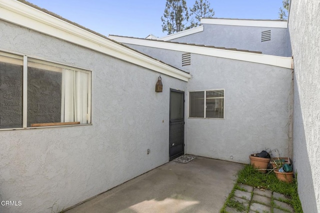 exterior space with a patio area