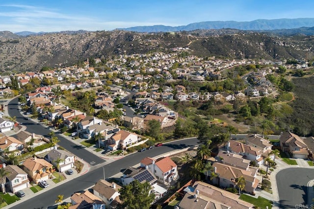 aerial view featuring a mountain view and a residential view