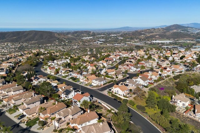 bird's eye view with a residential view and a mountain view