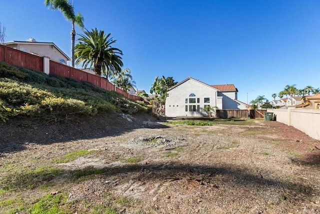 view of yard featuring fence