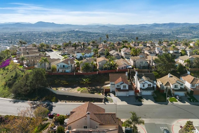 bird's eye view featuring a mountain view and a residential view