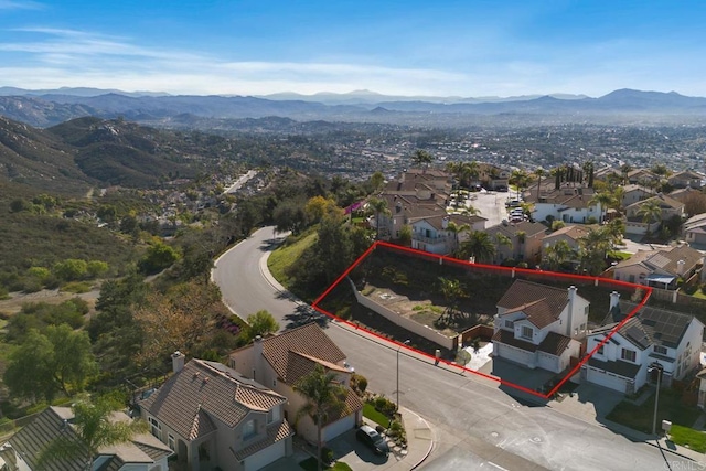 aerial view with a residential view and a mountain view