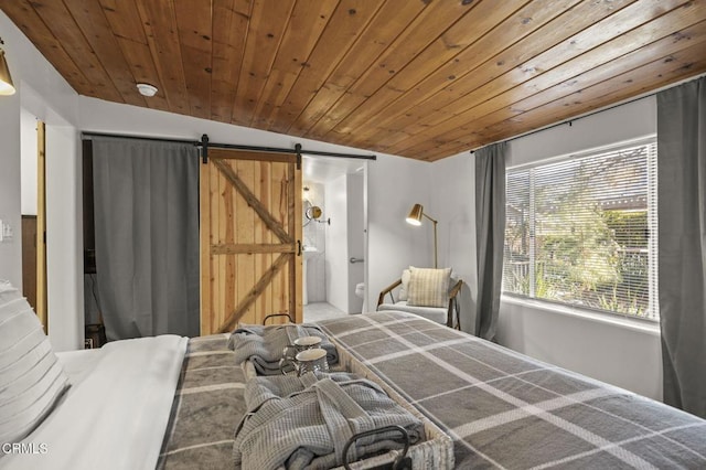 bedroom featuring a barn door and wooden ceiling