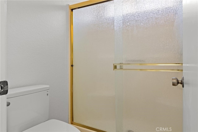 6 Daytona Dr Unit 128, Laguna Niguel, CA 92677 - full bathroom featuring toilet and a shower stall