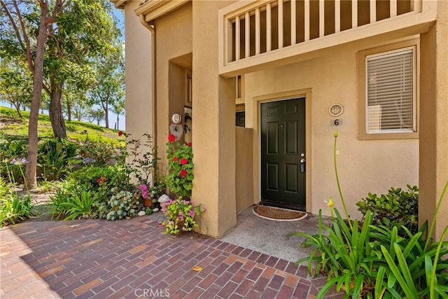6 Daytona Dr Unit 128, Laguna Niguel, CA 92677 - property entrance with stucco siding