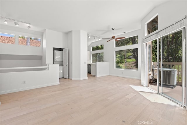 6 Daytona Dr Unit 128, Laguna Niguel, CA 92677 - unfurnished living room featuring track lighting, wood finished floors, and ceiling fan