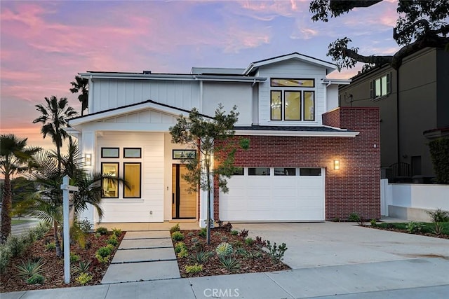 view of front of home with a garage