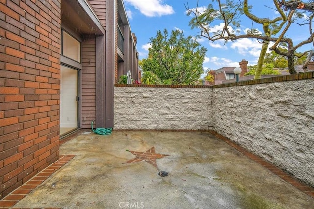 view of patio / terrace with fence