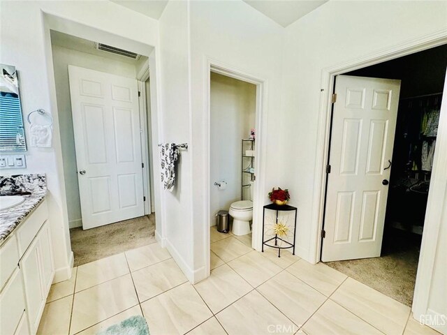 826 Jacob Creek Dr, Bakersfield, CA 93314 - bathroom with tile patterned floors, toilet, and vanity