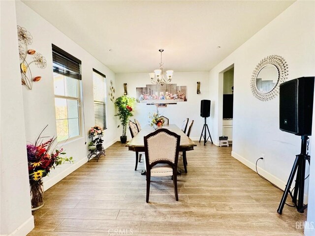 826 Jacob Creek Dr, Bakersfield, CA 93314 - dining room with an inviting chandelier and light wood-type flooring