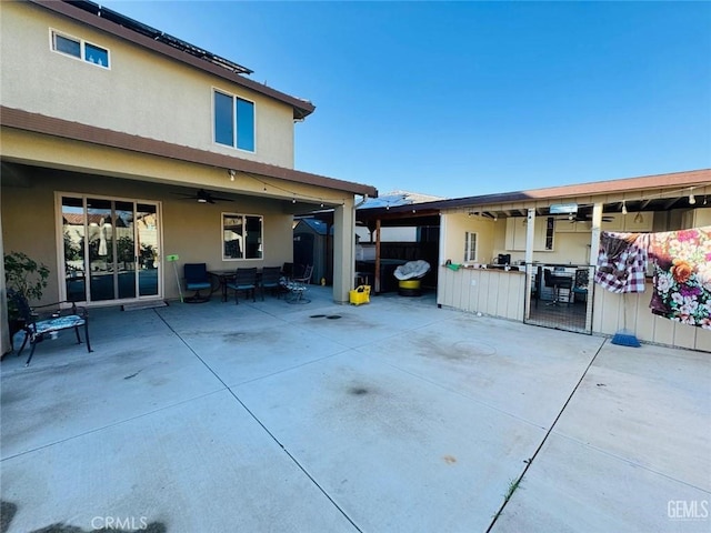 826 Jacob Creek Dr, Bakersfield, CA 93314 - back of house with a patio, ceiling fan, and a bar