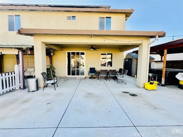 826 Jacob Creek Dr, Bakersfield, CA 93314 - back of property featuring a storage shed, an outdoor hangout area, a patio, and ceiling fan