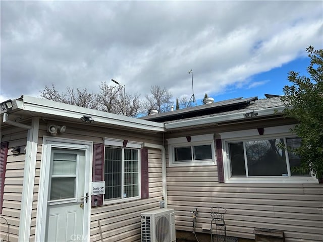 view of property exterior featuring ac unit