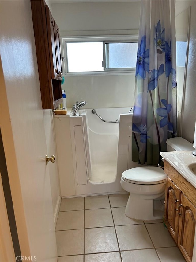 full bath with vanity, a shower with shower curtain, a tub, tile patterned flooring, and toilet