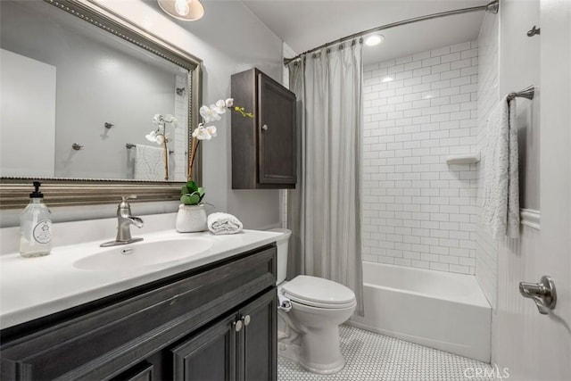 bathroom featuring toilet, tile patterned floors, shower / tub combo with curtain, and vanity