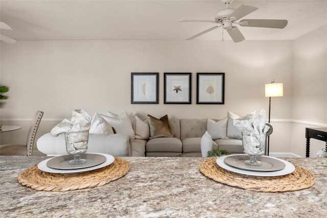 living room featuring ceiling fan