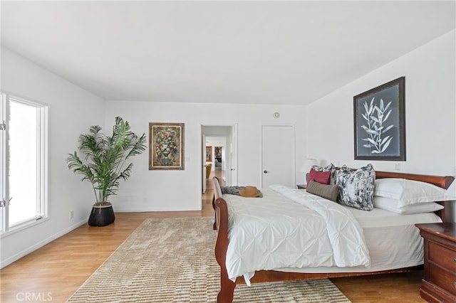 bedroom featuring light hardwood / wood-style floors