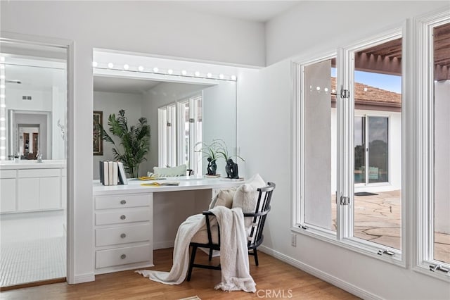 bathroom featuring vanity and hardwood / wood-style flooring