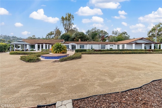view of front of home with a gazebo