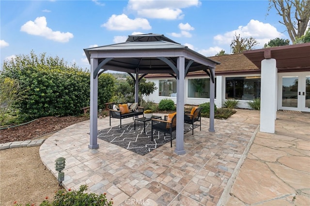 view of patio / terrace with a gazebo, outdoor lounge area, and french doors