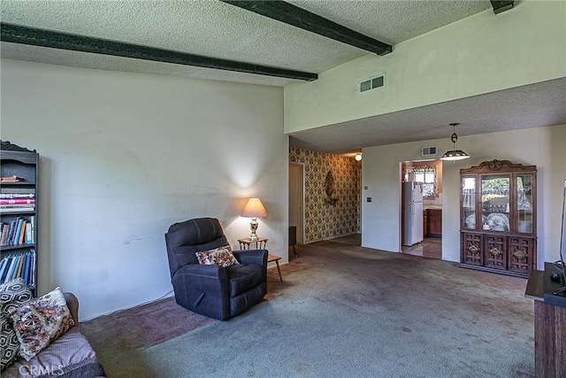 living area featuring vaulted ceiling with beams, dark carpet, and a textured ceiling