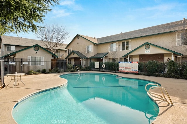 view of swimming pool featuring a patio