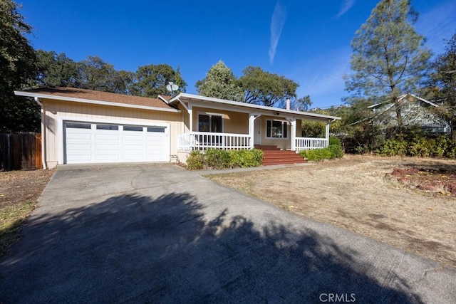 view of front of home featuring a garage and covered porch