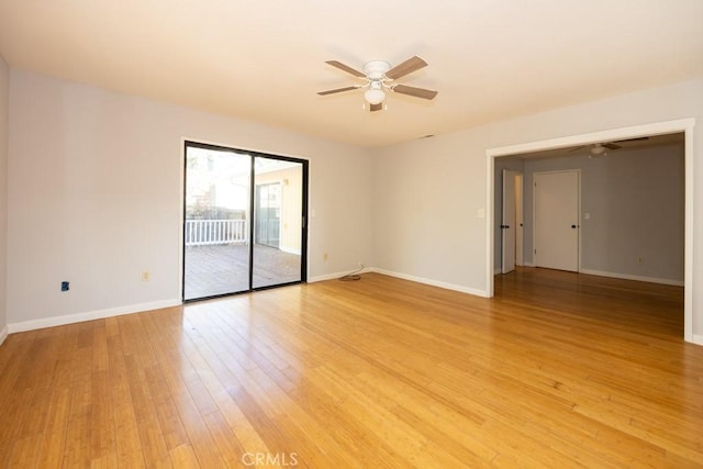 empty room with ceiling fan and light wood-type flooring