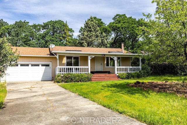 18686 Marine View Rd, Hidden Valley Lake, CA 95467 - single story home with a porch, a garage, driveway, and a front lawn