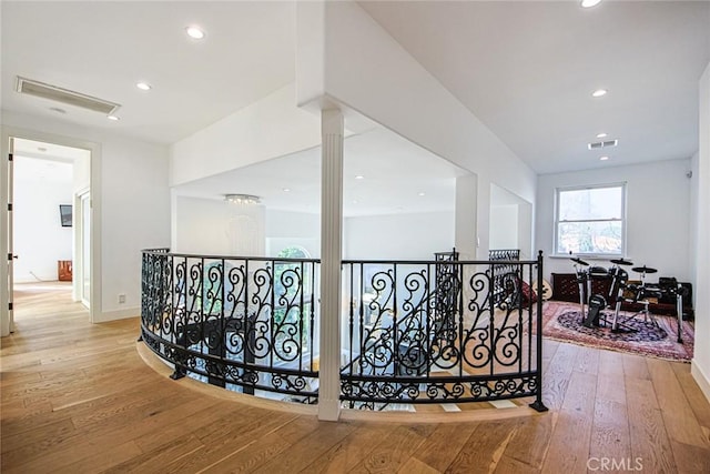 corridor featuring light hardwood / wood-style flooring