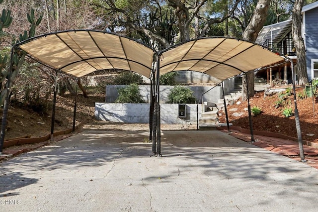 view of parking / parking lot with a carport