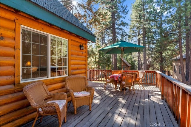 deck featuring outdoor dining space