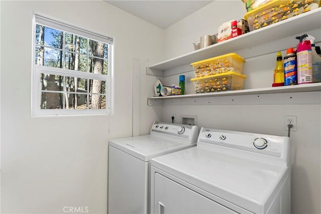 laundry area with laundry area and washing machine and dryer