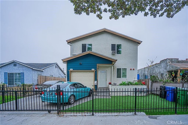 view of front of property featuring a garage and a front yard