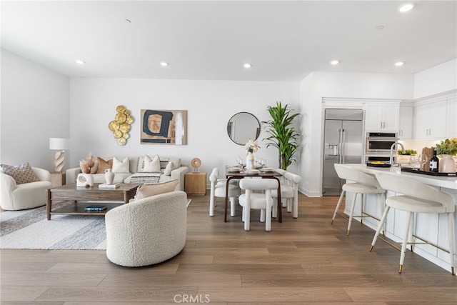 living room with hardwood / wood-style floors