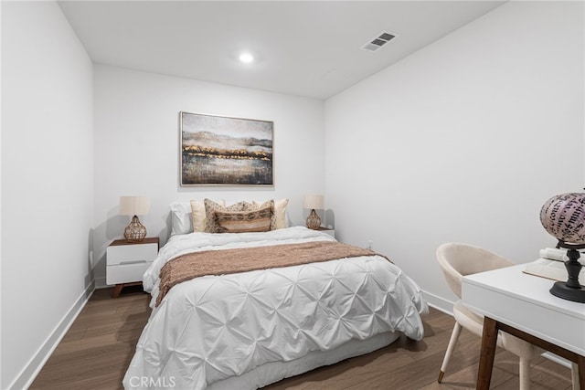 bedroom featuring dark hardwood / wood-style floors