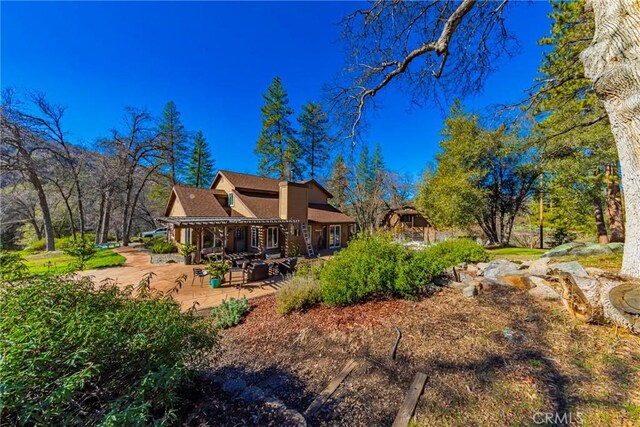 36763 Venado Dr, Coarsegold, CA 93614 - rear view of house with a patio
