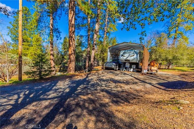 36763 Venado Dr, Coarsegold, CA 93614 - view of front of home with a carport and driveway