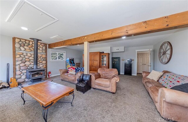 36763 Venado Dr, Coarsegold, CA 93614 - carpeted living area featuring a wood stove, attic access, and beamed ceiling