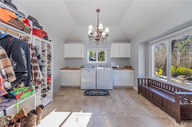 36763 Venado Dr, Coarsegold, CA 93614 - washroom featuring cabinet space, washer and clothes dryer, healthy amount of natural light, and a chandelier