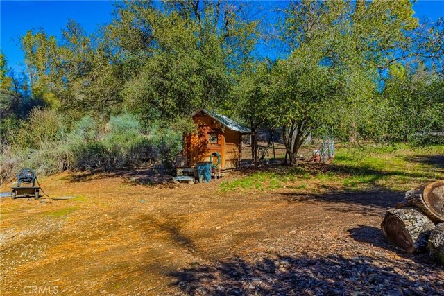36763 Venado Dr, Coarsegold, CA 93614 - view of yard featuring a storage shed