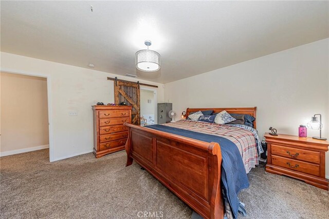 36763 Venado Dr, Coarsegold, CA 93614 - bedroom featuring light carpet and a barn door