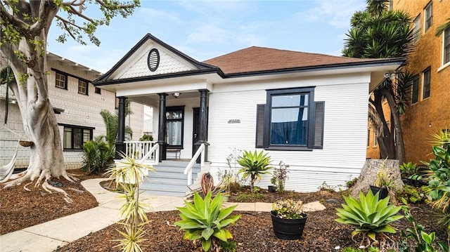 bungalow-style house featuring covered porch