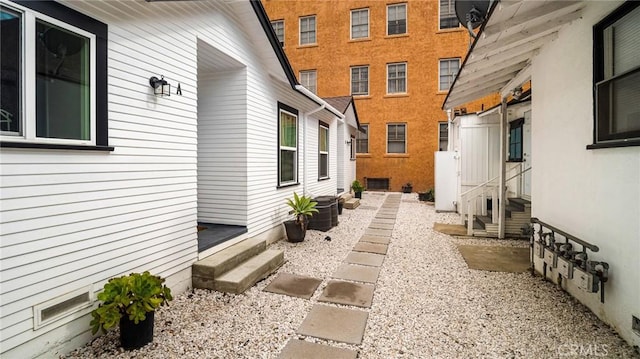 view of side of property featuring cooling unit