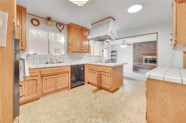 kitchen featuring a ceiling fan, dishwasher, open floor plan, a peninsula, and custom exhaust hood