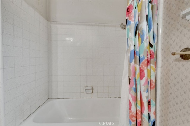 full bath featuring shower / bathtub combination with curtain