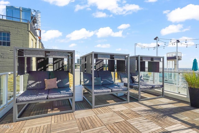 wooden deck featuring outdoor lounge area