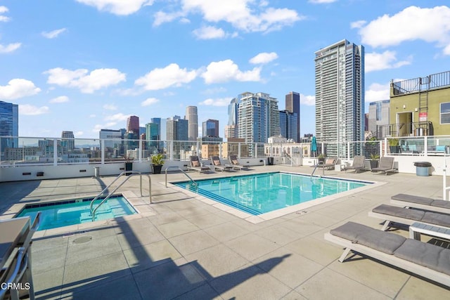 view of swimming pool featuring a patio