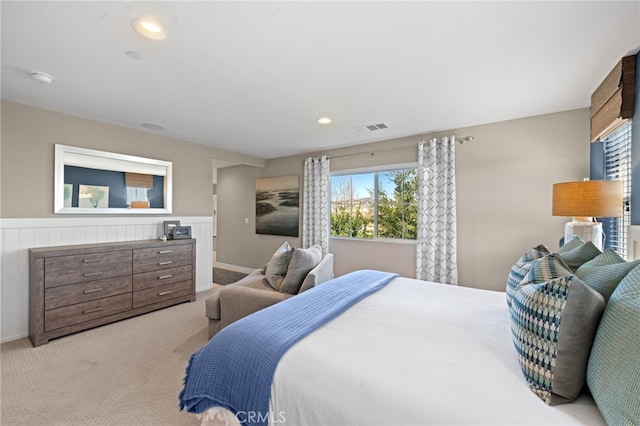 bedroom featuring recessed lighting, visible vents, and light colored carpet